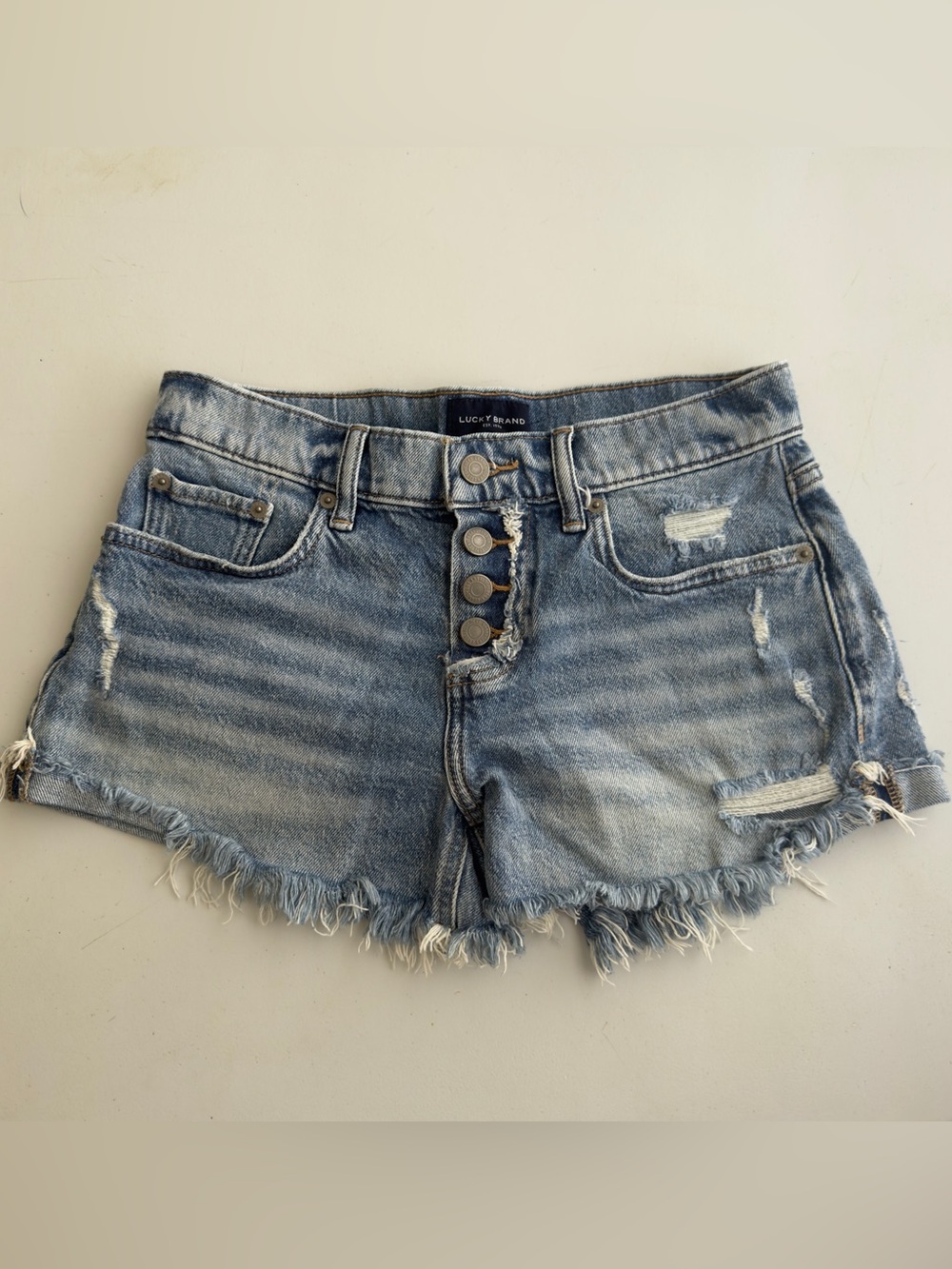 Lucky Brand Mid Rise Button Shorts Wom 0/25 Blue Denim Distressed Cut Off Jorts